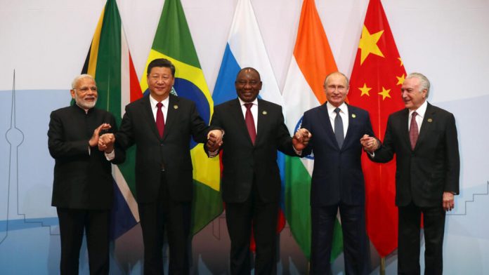 Leaders pose for a group picture at the BRICS summit meeting in Johannesburg